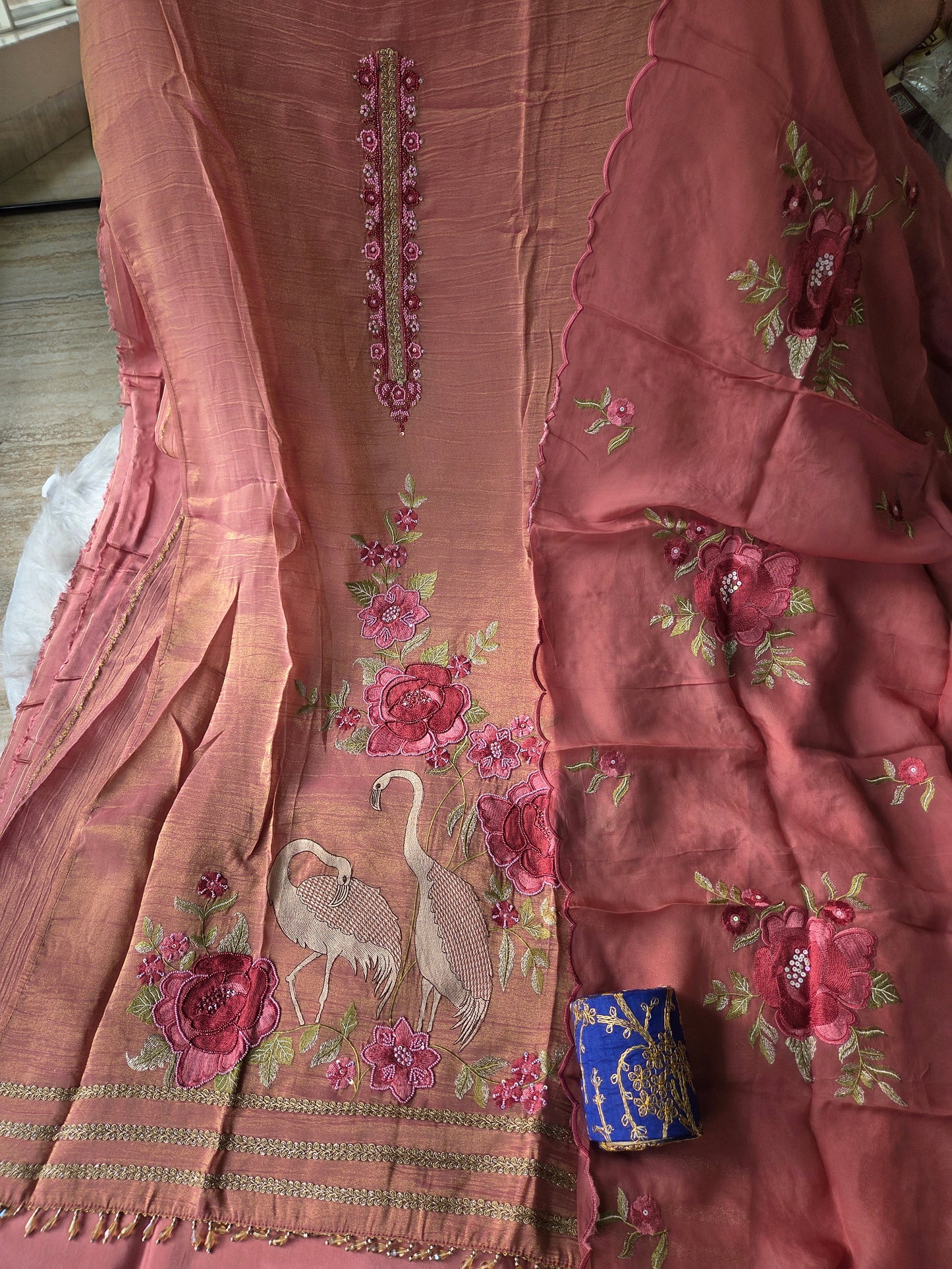 Mauve Embellished Shimmer Semi Stitched Suit